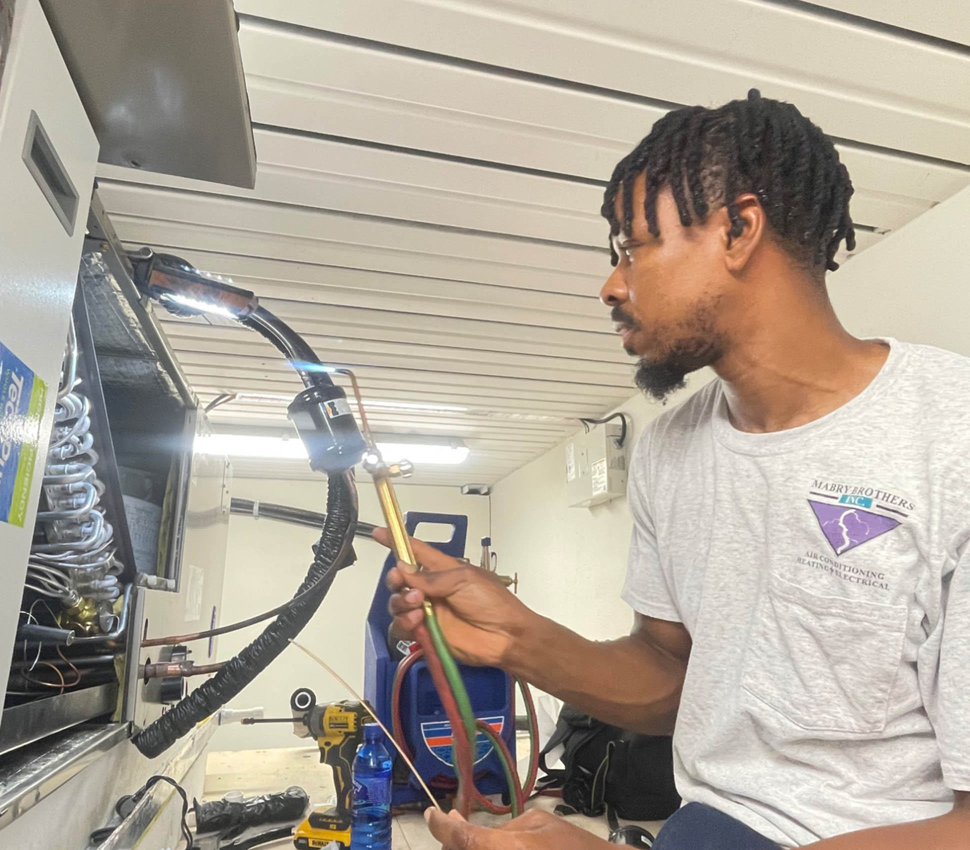 Air conditioning repair performed by Mabry Brothers technician in SWFL Home