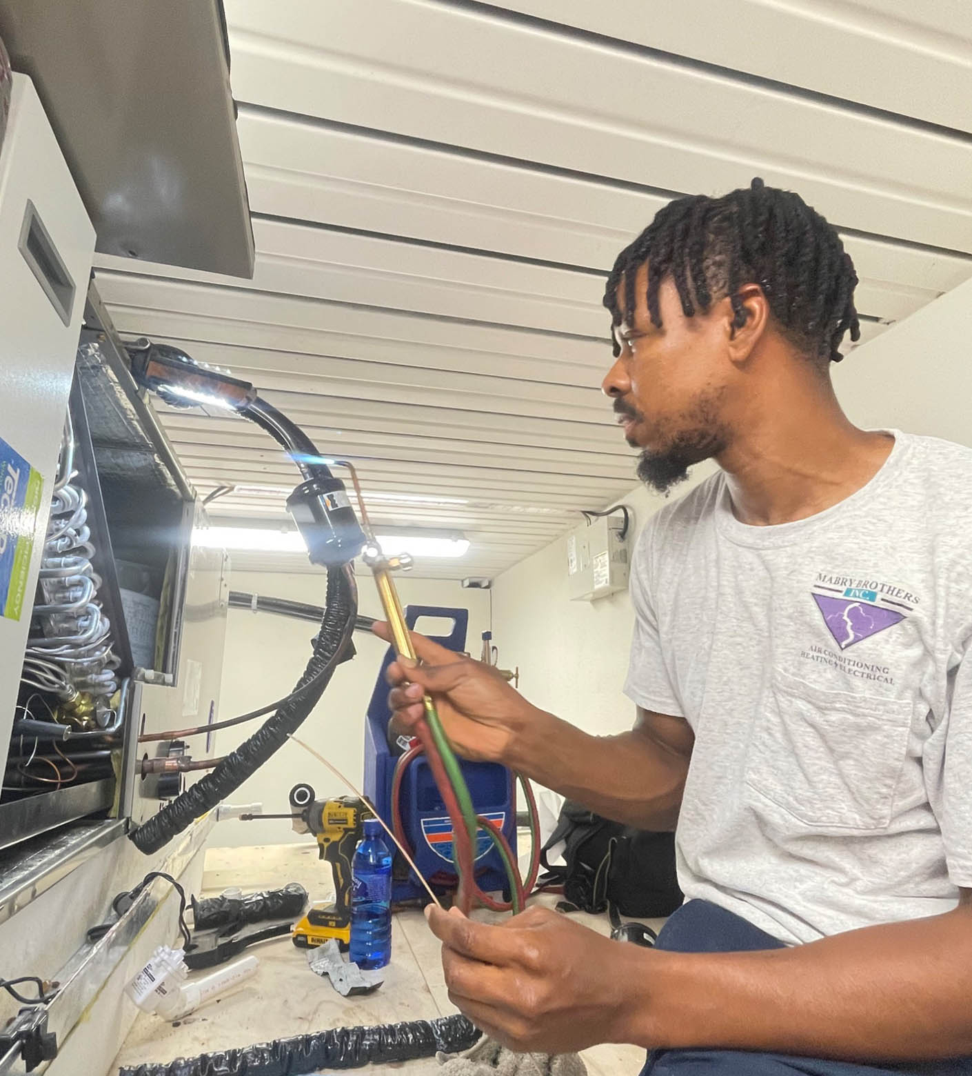 Mabry employee brazing copper ac line